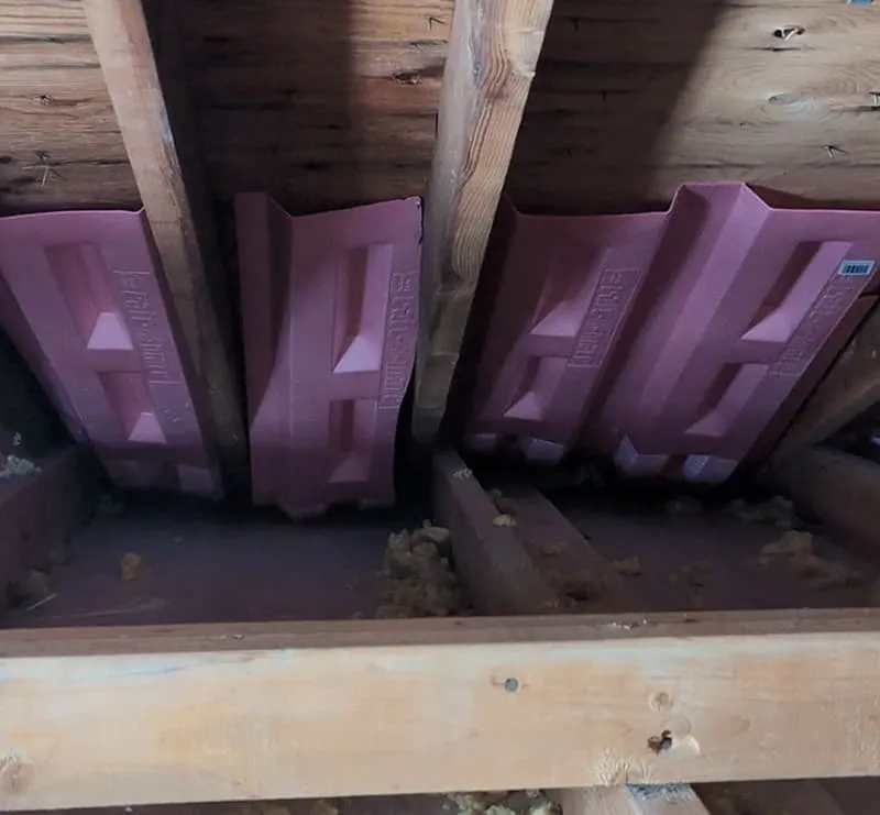 Dedicated Roofing team member working on a rooftop in Calgary.