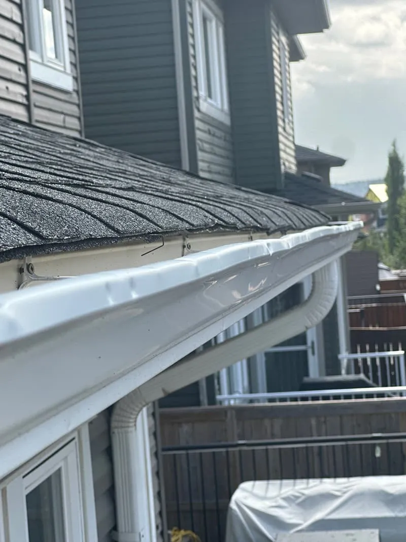 Dedicated Roofing team member working on a rooftop in Calgary.