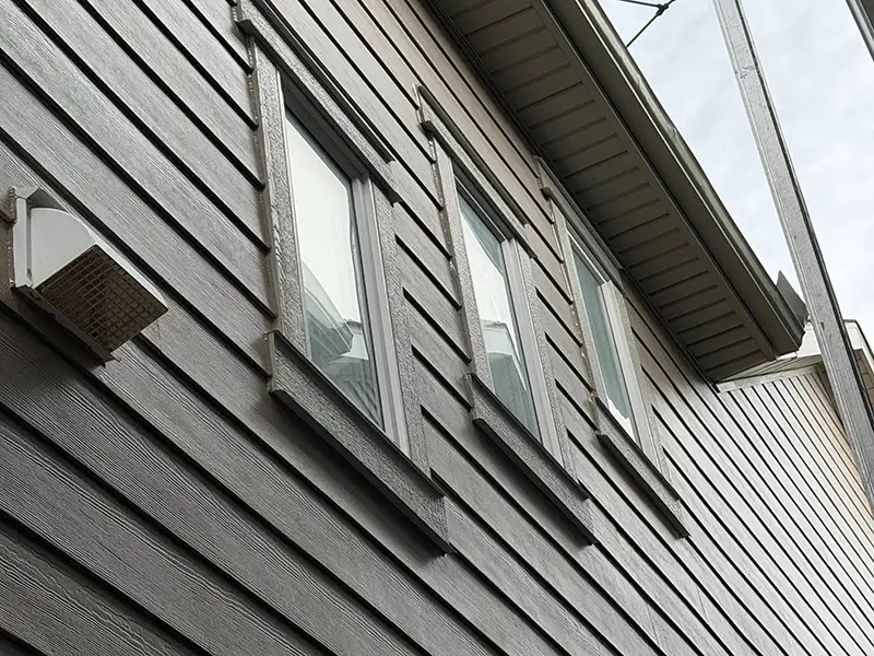 Siding installation work on a Calgary home