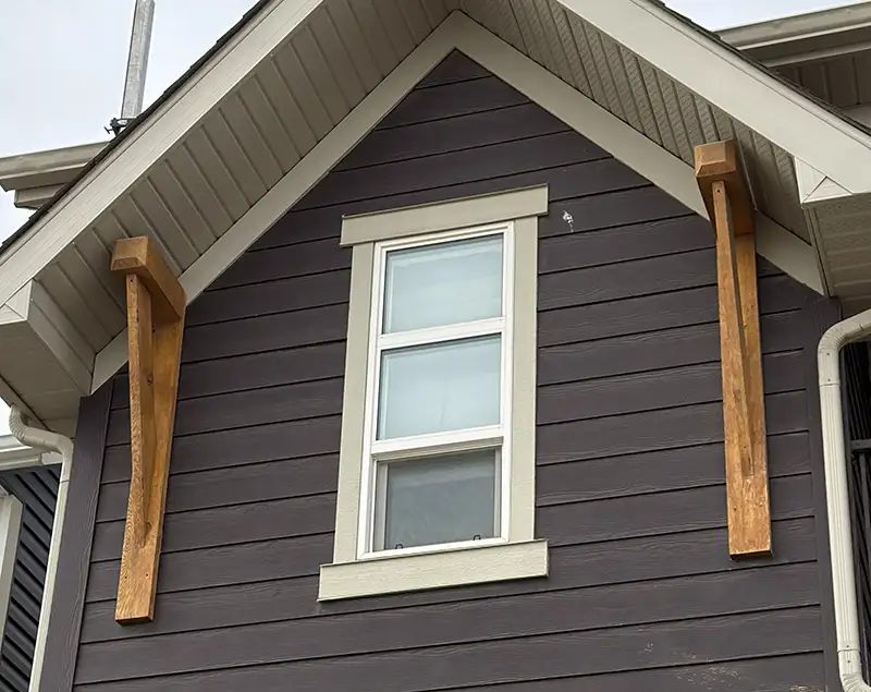 Fiber cement siding installation work on a Calgary home.