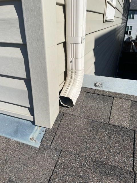 Downspout extensions Dedicated roofing and exteriors Calgary